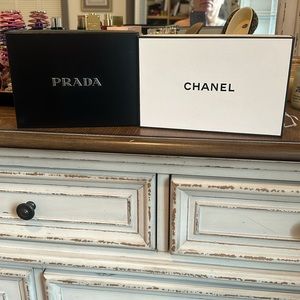 Chanel and Prada boxes